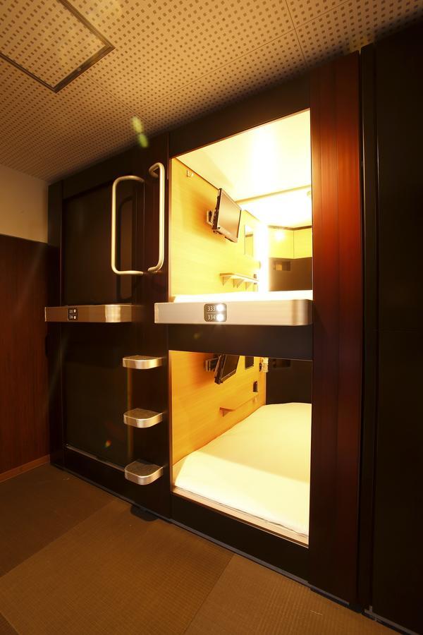 Sauna & Capsule Hotel Rumor Plaza Киото Номер фото